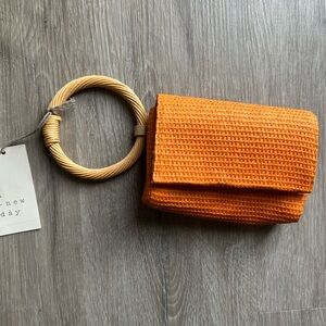 A New Day Vibrant Orange Woven Wristlet